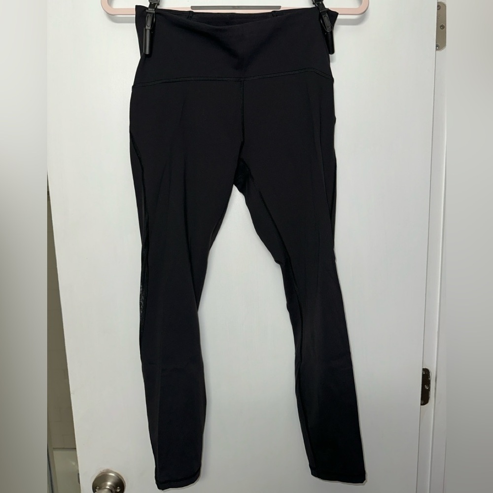 lululemon black leggings with mesh cut-outs on legs - size 10 (ish)